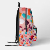 色数々のハート プリントバックパック (左)