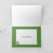 芝生の上にオレンジ色のサッカーボール カード (内部)