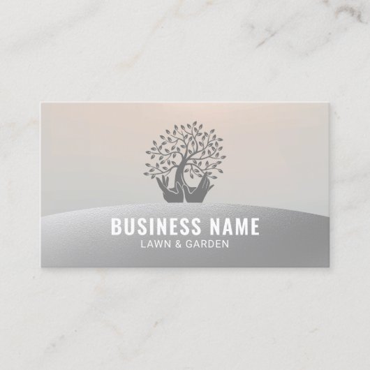 芝生気に手持ちツリーシルバー造園 名刺 (正面)