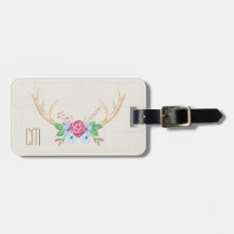 花が付いている素朴な水彩画のシカの(雄ジカの)枝角