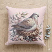 花とオリーブの枝に囲まれたピンクの鳩の巣 クッション