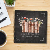 花と引用文が描かれた黒いノート ノートブック