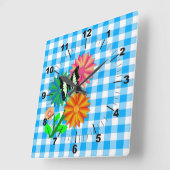 花と蝶の青いヴィッキー スクエア壁時計 (傾斜)