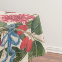 花と蝶を持つ茶色の鳥