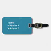 花に座る白ふわふわかわいらしうさぎ青 ラゲッジタグ (正面横)