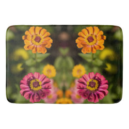 花のオレンジとピンクのジニア バスマット