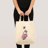 花のオーガニックな食料雑貨のトートを持つ蝶 トートバッグ (正面(商品))