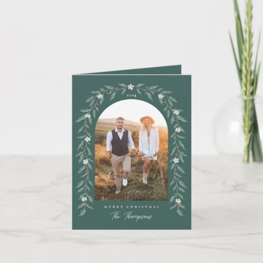 花のガーランドがアーチ状に写る 緑のクリスマスカード シーズンカード (正面)
