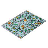 花のパターンオレンジの渦巻きベリーティール（緑がかった色） ノートブック (左側)