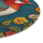 花の中に隠れカラフルた鳥 カッティングボード (角)