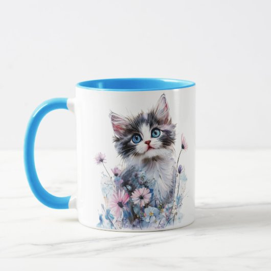 花の中の可愛い子猫の描かれたマグカップ マグカップ (左)
