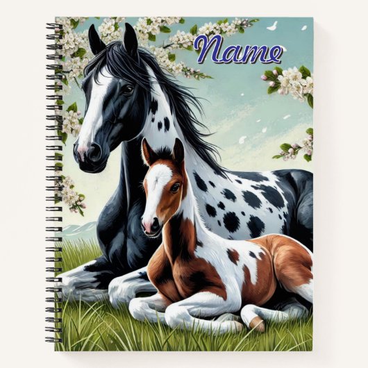 花の咲く木々の間で休む馬と馬 ノートブック (正面)