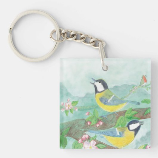 花の咲く木の枝で鳥が歌う キーホルダー (正面)