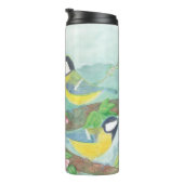 花の咲く木の枝で鳥が歌う タンブラー (回転右)