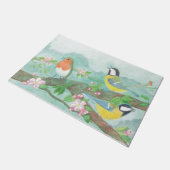 花の咲く木の枝で鳥が歌う ドアマット (アングル)