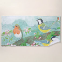 花の咲く木の枝で鳥が歌う ビーチタオル