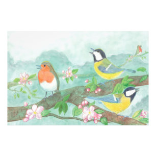 花の咲く木の枝で鳥が歌う フォトプリント