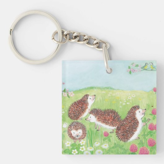 花の咲く草原に四つの小さなハリネズミ キーホルダー (正面)