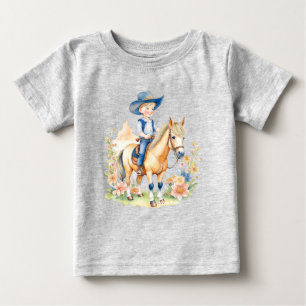 花の咲く馬に乗った小さなカウボーイ ベビーTシャツ