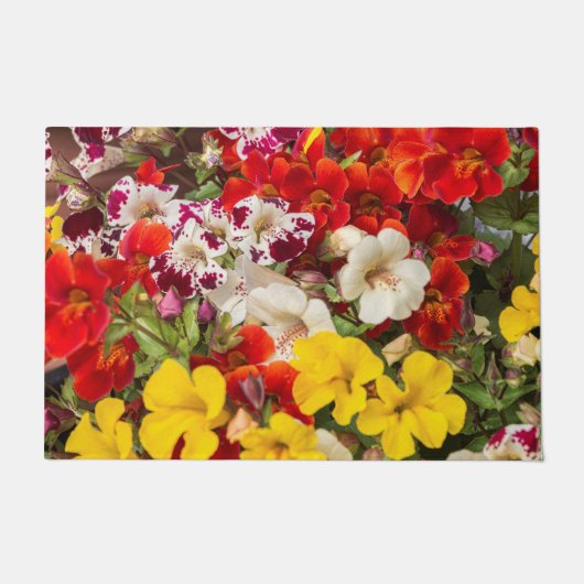 花の明るい色の花 ドアマット (正面)