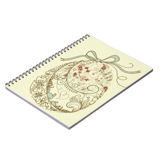 花の要素が付いているイースターエッグ ノートブック (左側)
