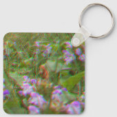 花の間で発見されたビッグフットKeychain キーホルダー (裏面)