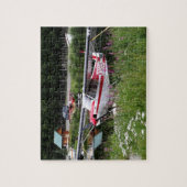 花の間に飛行機を浮かべるアラスカ ジグソーパズル (縦)