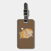 花を持つかわいいリトルハムスター ラゲッジタグ (正面縦)