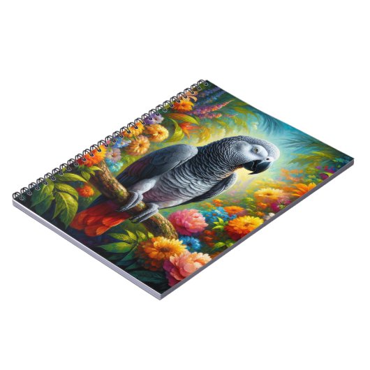 花を持つアフリカの灰色のカラフルオウム ノートブック (左側)