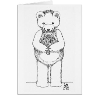 花を持つテディー・ベア