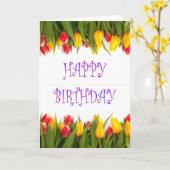 花を持つ姑へのハッピーバースデー カード (黄色い花)