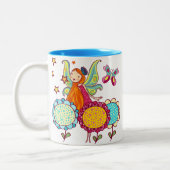 花を持つ庭の妖精 ツートーンマグカップ (左)