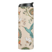 花を様式化したベージュのシームレスなパターンとb タンブラー (回転左)