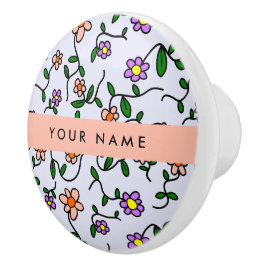 花カラフル、青い背景、オレンジ セラミックノブ