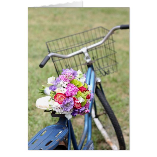 花カードが付いているヴィンテージのバイク (正面)