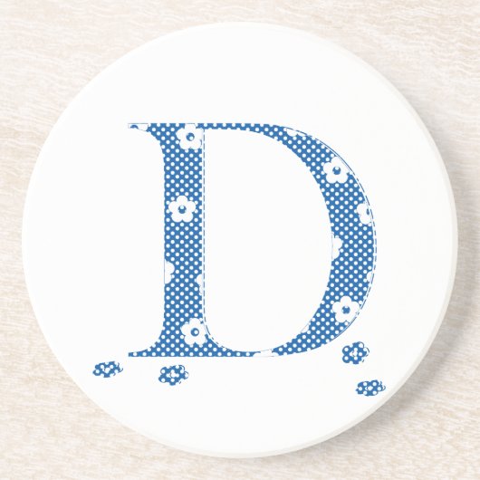 花パターン(の模様が)ある文字D (青と点) コースター (正面)
