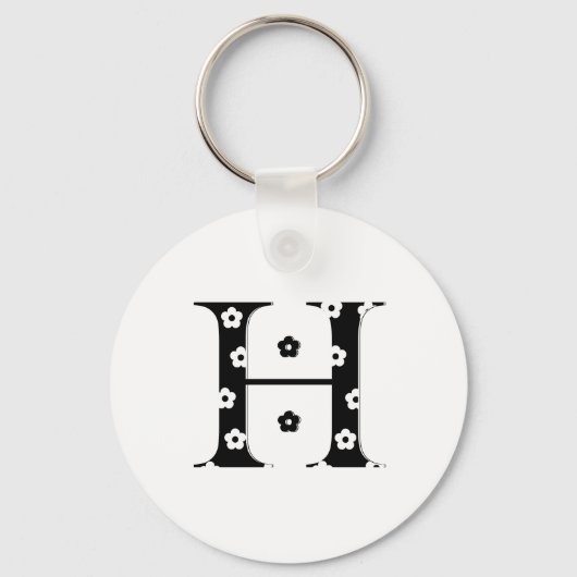 花パターン(の模様が)ある文字H キーホルダー (正面)