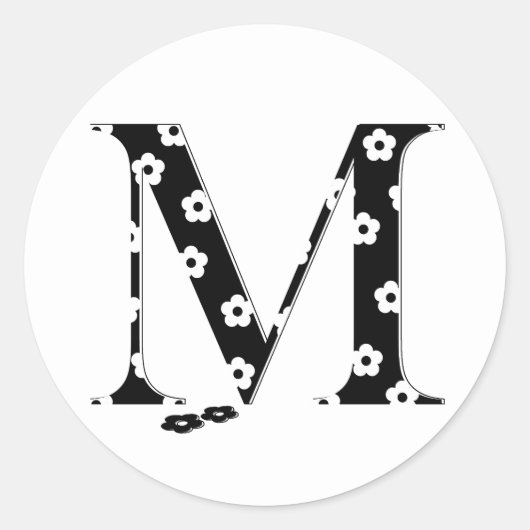 花パターン（の模様が）ある文字M ラウンドシール (正面)
