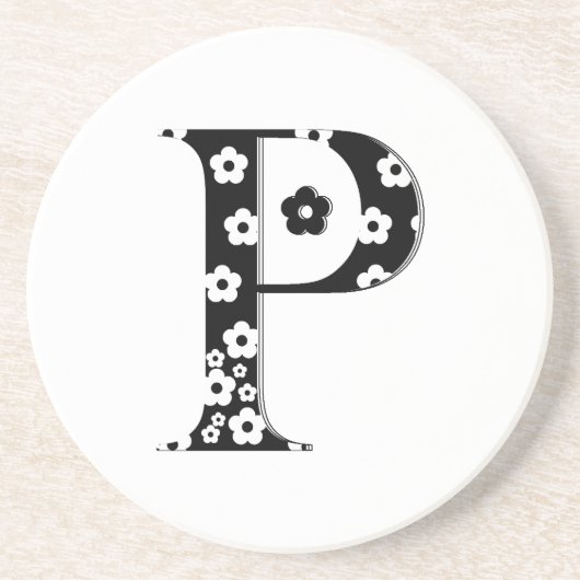花パターン（の模様が）ある文字P コースター (正面)