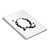 花パターン(の模様が)ある文字Q ノートブック (右側)