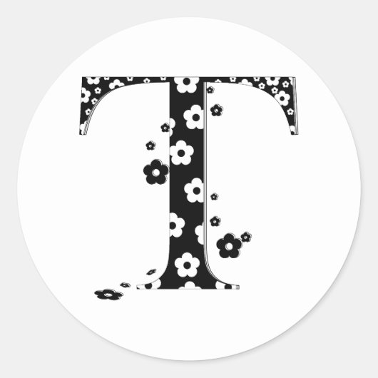 花パターン（の模様が）ある文字T ラウンドシール (正面)