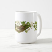 花咲く枝の上の鳥の巣の中の鳥 コーヒーマグカップ (正面右)