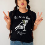 花嫁または死ぬまで死ぬまで我々パーティーバチェロレッテ Tシャツ<br><div class="desc">祝「Bride Or Die」のシエレガントャツを着てパーソナライズされた、バチェロレッテをダークにツイスト。ゴシックのバチェロレッテに結婚最適なシャツで、「Til Death Do Weパーティー」の精神を体現。 印象的なスケルトンの花嫁のグラフィックを搭載し、あなたの祭りユニークに神経質なしゃれているを追加する。あなたはハロウィーンをテーマにしたバッシュを計画するか、単にゴシックの美学を愛するかにかかわらず、このシャツはあなたの特別な夜に最適な選択である。これらのおもしろいバチェロレッテシャツはスタイリッシュ単にだけでなく、ブライダルパーティの各メンバパーソナライズされたーのためでもある。彼らカスタマイズは夫々の名前を持ち、これらのマッチのティーは誰もが含ま感じれ、特別なことを保証する。マルティーニガラスの詳細はよくはしゃぐtouchを加え、おもしろいと笑いの夜に理想的なシャツを作る。花嫁パーソナライズされたのシャツとして、彼らはあなたのブライダルパーティ素晴らしに感謝を示す方法であって、テーマは凝集し、思い出に保残る。私たちパーソナライズされたの「花嫁または死」シャツは単なる服装ではなく、あなたの花嫁がパーティーが終わった後に長い間大切にしてくれる形見だ。これらのシャツは優れたハロウィーンのバチェロレッテの好意を作り、ユーモアとスタイルをシームレスにブレンド。あなた祝のバチェロレッテの統一、おもしろい、ゴシックの魅力を完璧に捉えたシャツを着た新しいナプティアルは、誰もが忘れられないイベントとなっている。</div>