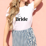 花嫁モダンレトロバチェロレッテホワイトシャツ Tシャツ<br><div class="desc">クラシックミニマルモダン主義のレトロバチェロレッテシャツで花嫁に最適。完璧なイベントのために私たちのマッチングの新郎のバチュラーパーティシャツと一緒にそれをマッチ。</div>