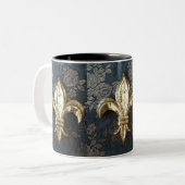 花柄のマグの金ゴールドの（紋章の）フラ・ダ・リ ツートーンマグカップ (正面左)
