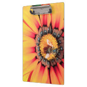 花粉を集めるミツバチの極端なクローズアップ クリップボード (左)