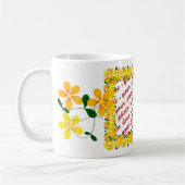 花(オレンジと黄色の枠) コーヒーマグカップ (左)