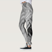 芸術家によるC.L.ブラウンブラシをかけられた鋼鉄レギンス レギンス (左)