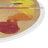 芸術的なパレットはカラーホイールにブラシをかけます カッティングボード (角)