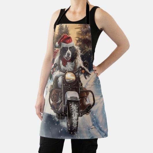 英国のセッタードッグにオートバイクリスマスに乗る エプロン (インサイチュ)